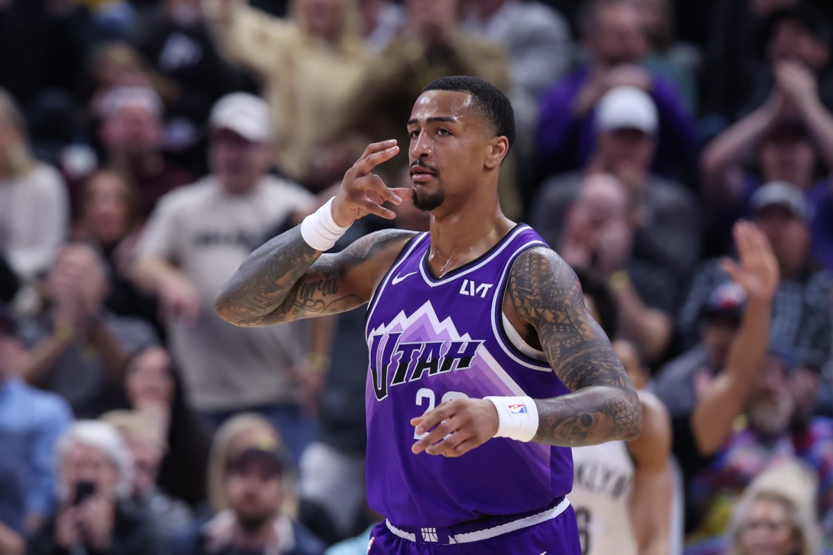 Dec 18, 2023; Salt Lake City, Utah, USA; Utah Jazz forward John Collins (20) reacts after making a three-point shot against the Brooklyn Nets during the fourth quarter at Delta Center.